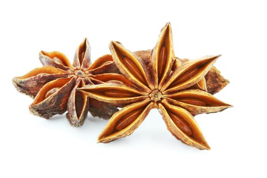Star Anise on a white background with shadow. Shallow DOF.