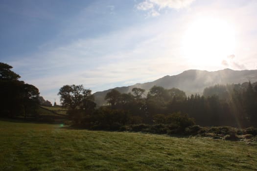 Mist rolling up a valley