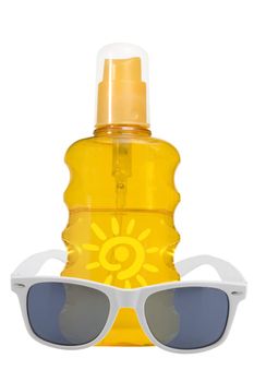 oil product, sun protection and sunglasses on white background