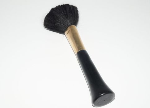 Cosmetic brushes on white background .