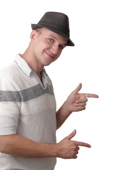 A smiling  young man showing of hands making shape like guns .