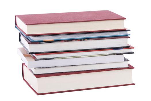 color tower books on white background arranged in stack