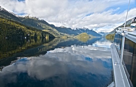 Boat trip across Lake Manapuri in New Zealand.