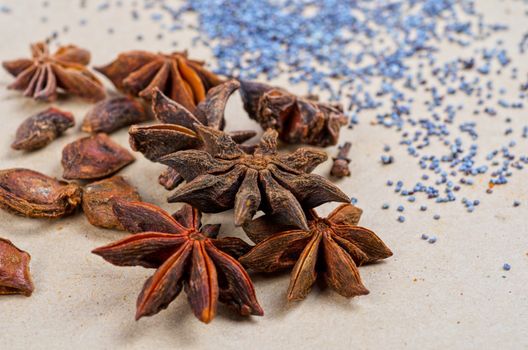 Anise stars close-up on a brown background