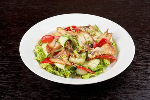 Salad of smoked eel, lettuce,Chinese cabbage and vegetables