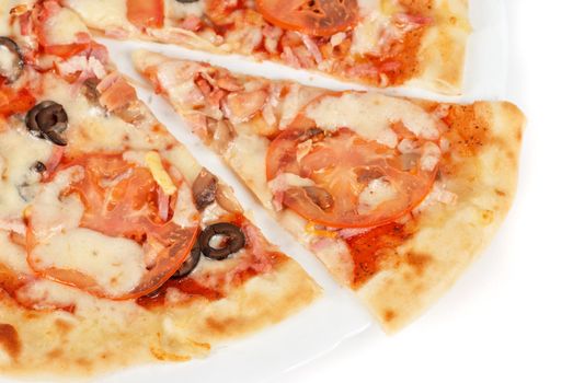 meat pizza closeup with carbonado ham, tomato, olive and mozzarella cheese