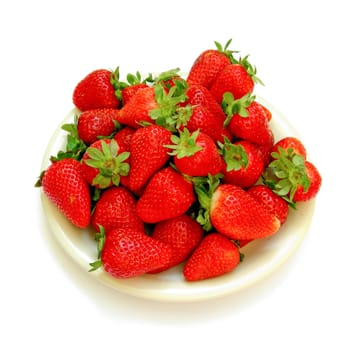 Detail of strawberries in a dish isolated over white