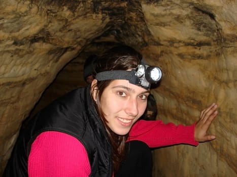 cave; girl; smile; tourism; study; type; background; locked space;  mine; beauty; landscape; texture 