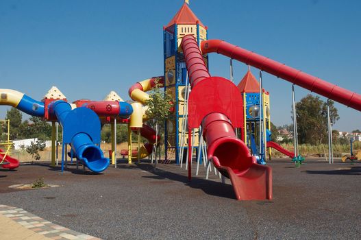 Outdoor kids playground with bright colors .