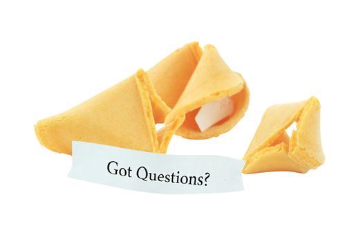 Broken fortune cookies isolated on white with message "Got Questions?" Clipping path included. Text easily removed.