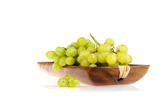 grapes in a wooden tray