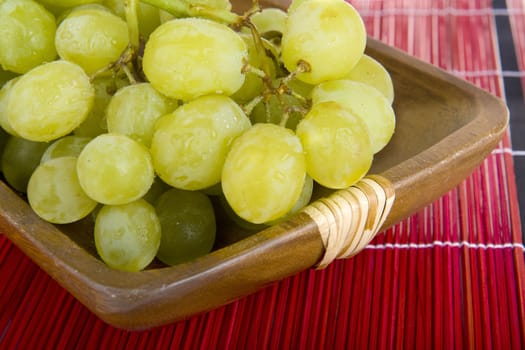 grapes in a wooden tray