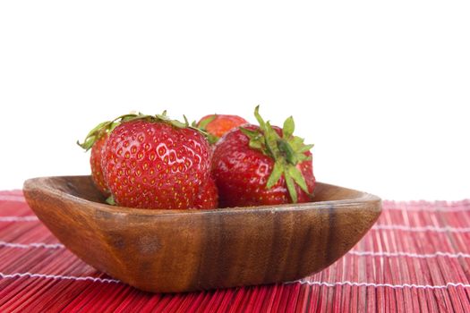 strawberries in a wooden tray