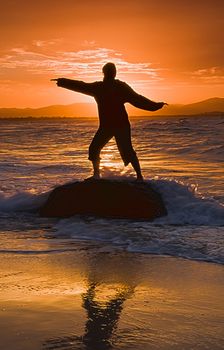 Silhouette of a Woman at sunset.