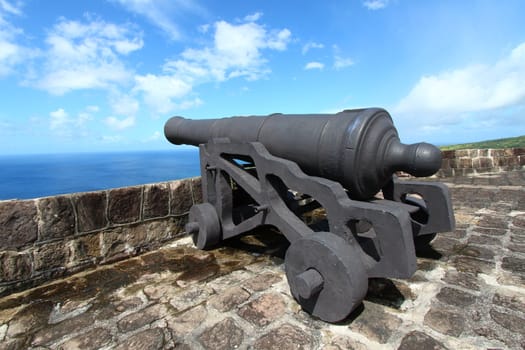 A cannon faces the Caribbean Sea at Brimstone Hill Fortress National Park in St Kitts.