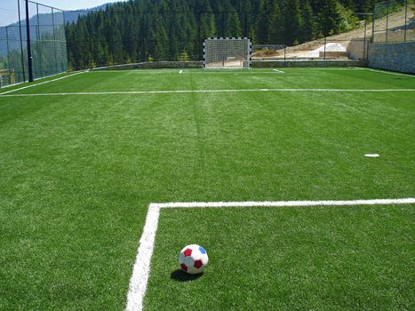  empty soccer field in the mountains                