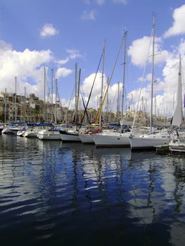 Beautiful yachts moored at the Vittoriosa Yacht Marina in Malta in the Med