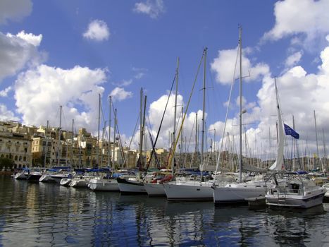 Beautiful yachts moored at the Vittoriosa Yacht Marina in Malta in the Med