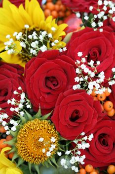 Red roses and sunflowers, flower background