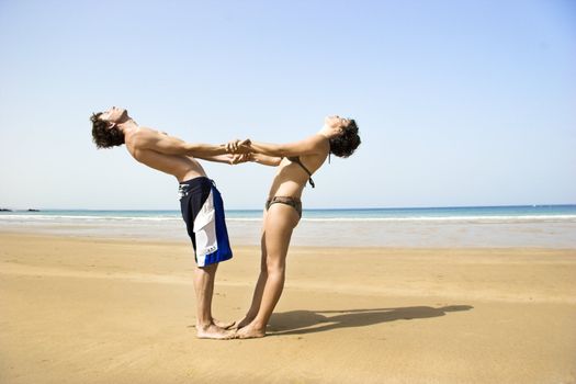 Young couple having fun on the beach