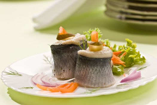 Macro picture of fillet herring with vegetables