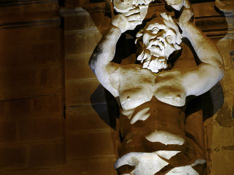 Medieval statue or gargoyle in the old city of Mdina in Malta, on public National Cathedral Museum