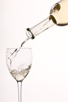 drink series: white wine pouring to a glass