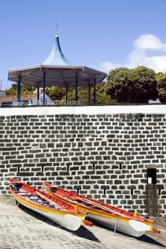 Long rowboats in beaching place