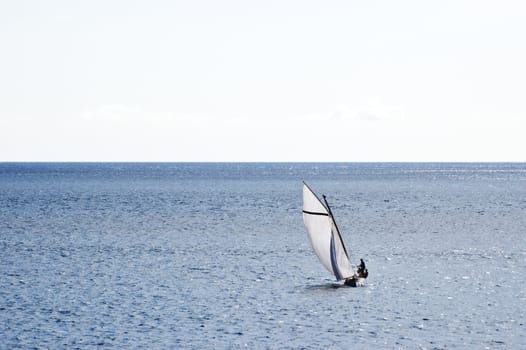 Sailing boat in open sea