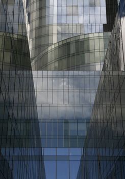 a business complex, blue buildings with geometrical forms, a world trade center
