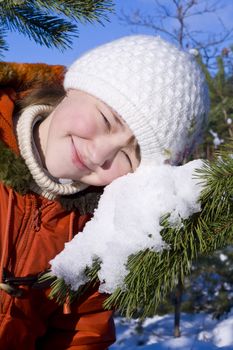 Happy young girl on the snow