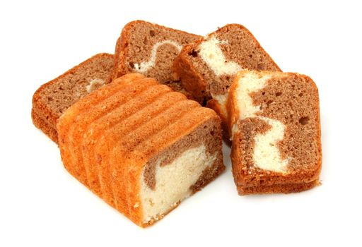 Slices of a chocolate cake on a white background 