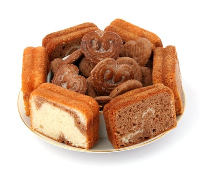 Slices of a chocolate cake on a white background 