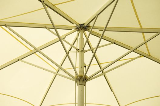 Close up of the inside of an open big umbrella