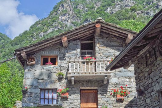 Typical Northern Italian Alps houses called Baita, made of wood and stone