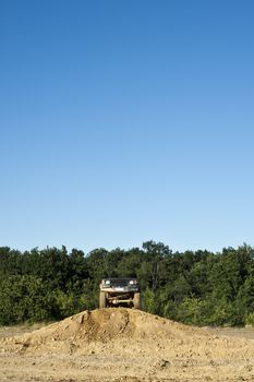 Jeep coming out of a muddy hole during a demonstration