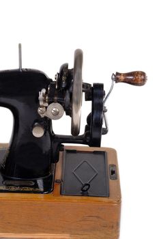 Old sewing machine. Taken on white background.