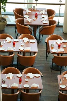 Tables in a resturant seen form above.