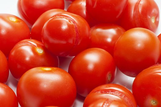 italian red cherry tomatoe group in white background
