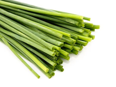 Closeup picture of fresh chives on white background