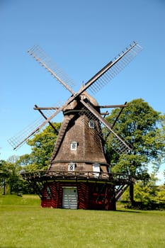 Old windmill and clear blue sky