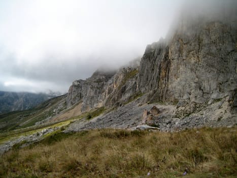 Mountains, caucasus, rocks, a relief, a landscape, the nature, a panorama, a landscape, a ridge, top, breed, the sky, reserve, a pattern, a background, a kind, a structure, a slope, peak, beauty, bright, a file, clouds, a stone