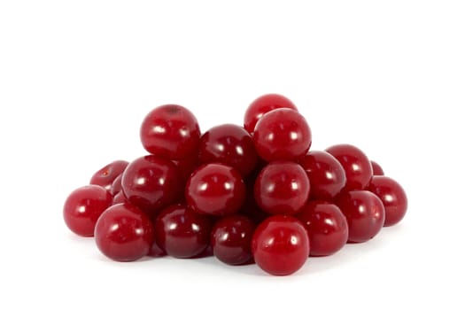 Heap of fresh cherries isolated on white