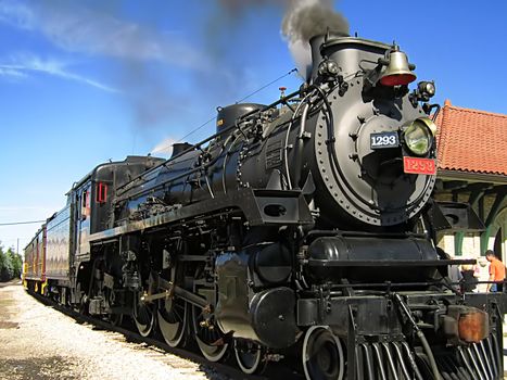 A photograph of an old steam locomotive.