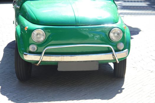 the front of a classic Italian car in detail