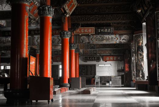 Chinese temple interior structure with pillar and inscribe.