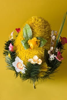 Festive egg with chicken on yellow background
