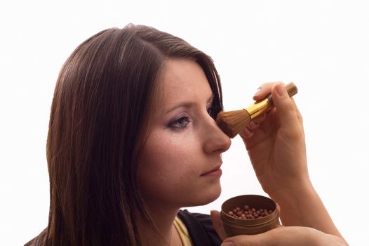 Putting the make-up on the face