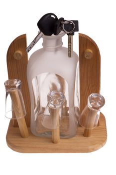 Bottle of alcohol with car keys to white background 