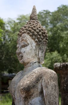Close- Up of beautiful statue carved in rock at Sukhothai, Thailand